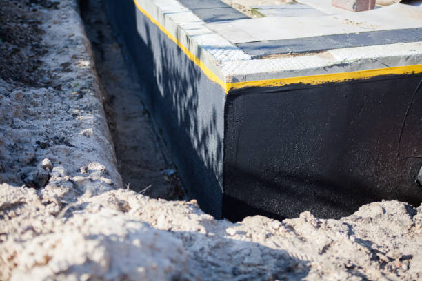 Professional Basement Waterproofing technician working in Lafayette, TN